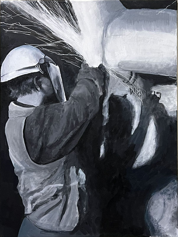 builder grinding welding overshoot off structures