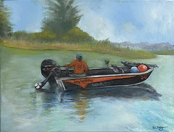 SOLD. Devon navigating a river in a Whaler boat